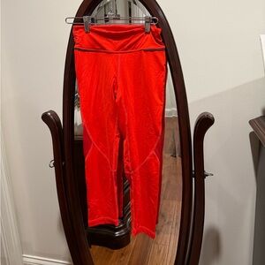 ALALA Fiery Red Cropped Athletic Leggings With Mesh Cutouts